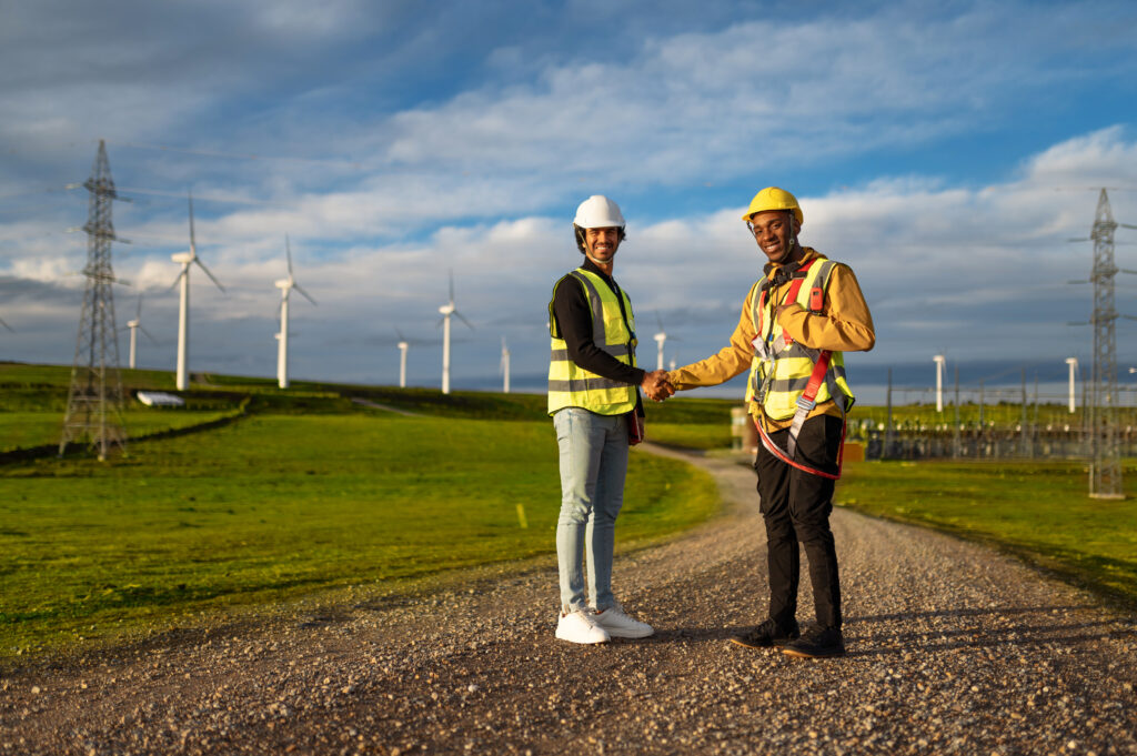 engineer and worker shaking hands